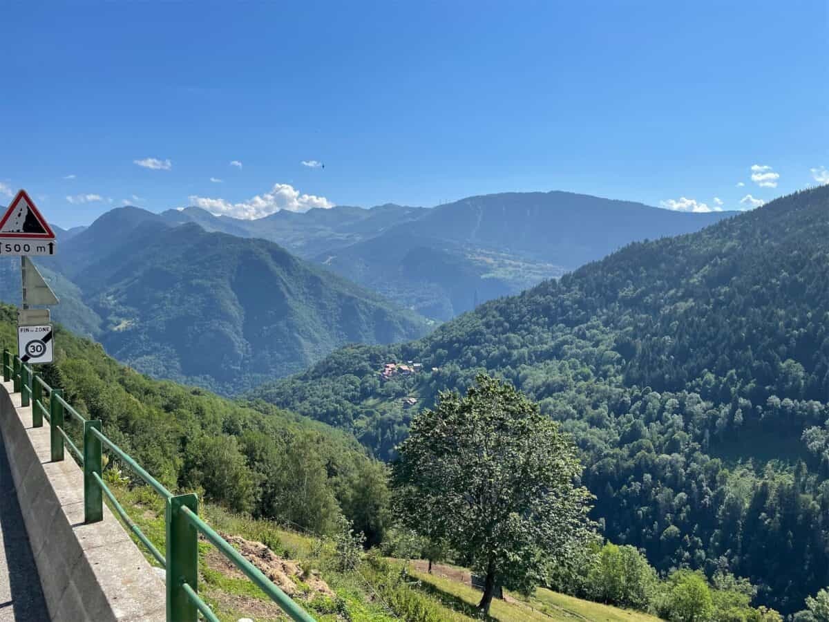 view of surrounding alpine mountains at the col de la madeleine midway point