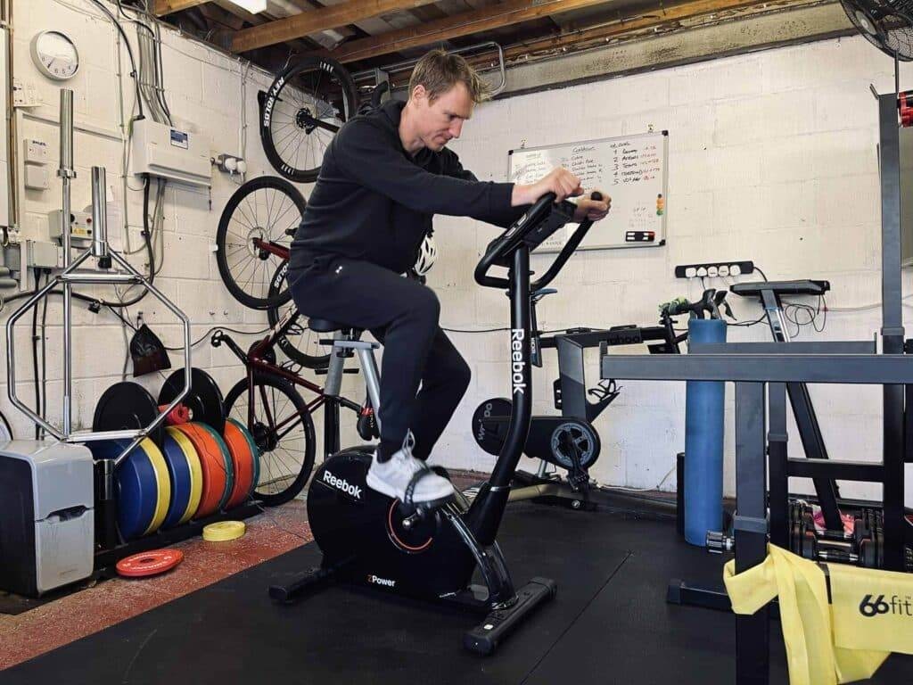 person working out on an indoor excercise bike