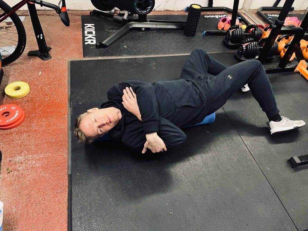 cyclist stretching his back