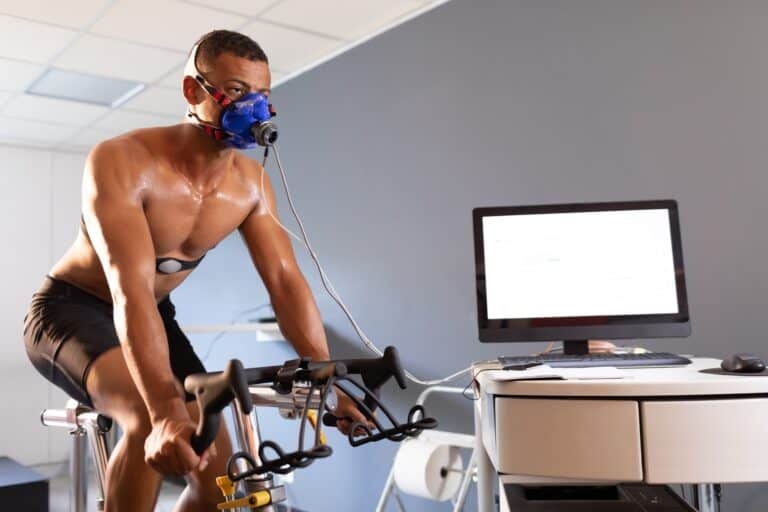 man on excercise bike performing vo2 max test
