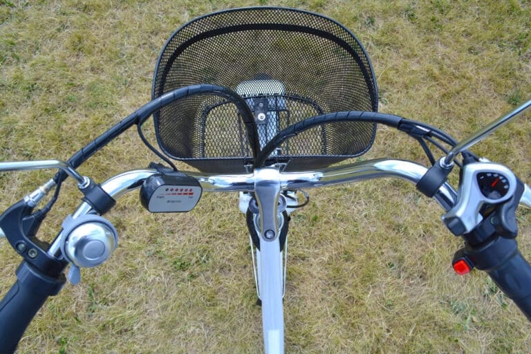 A close up view of the handlebars of a bicycle.