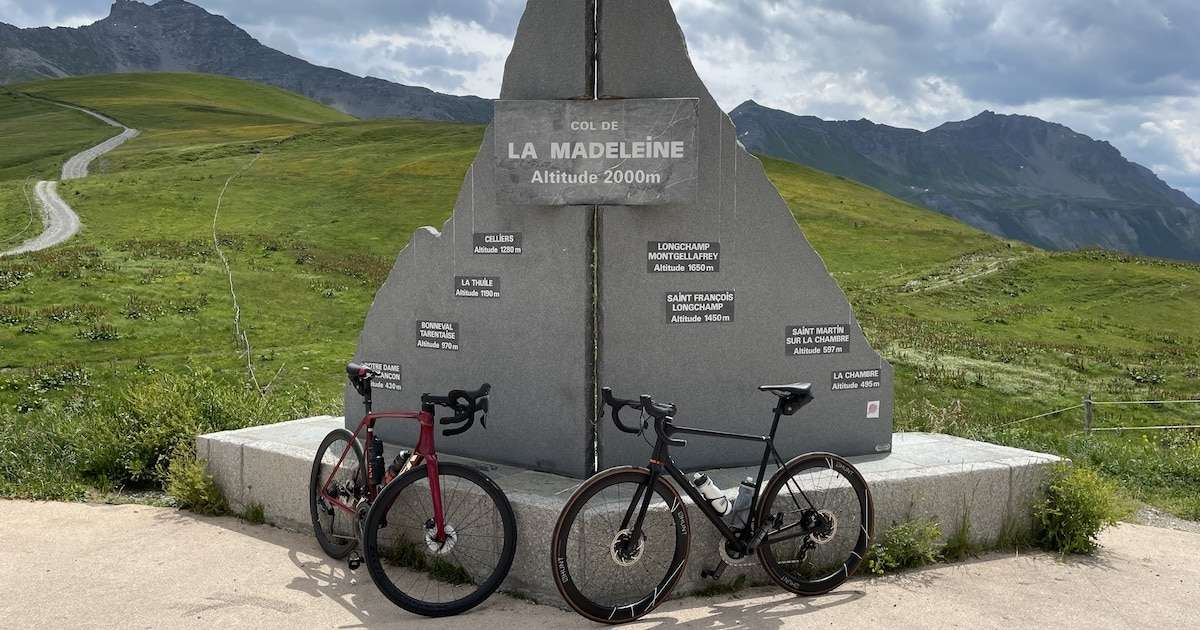 Col de la Madeleine marker with 2 bikes in front