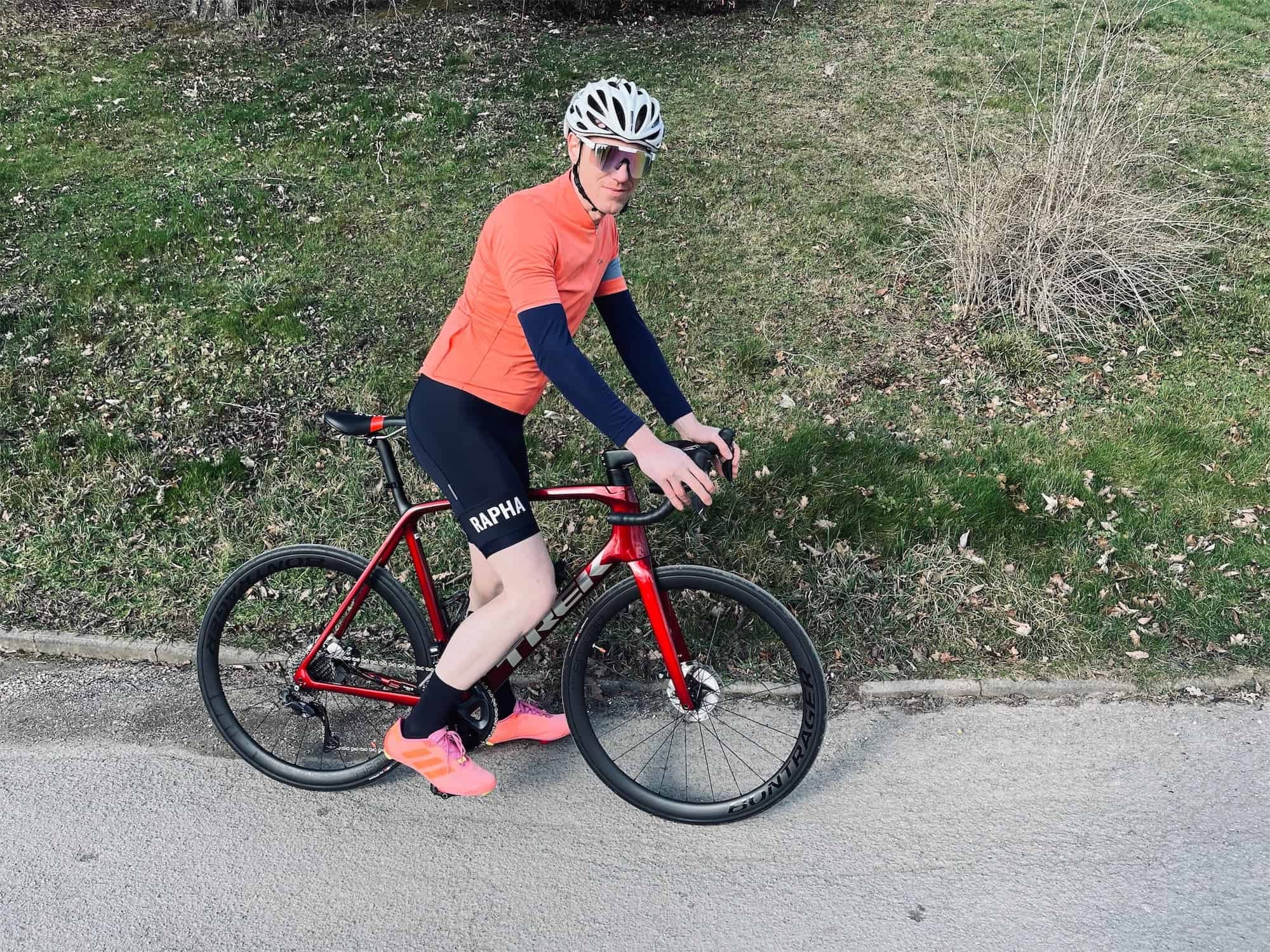 A beginner cyclist endurance training on a paved road.