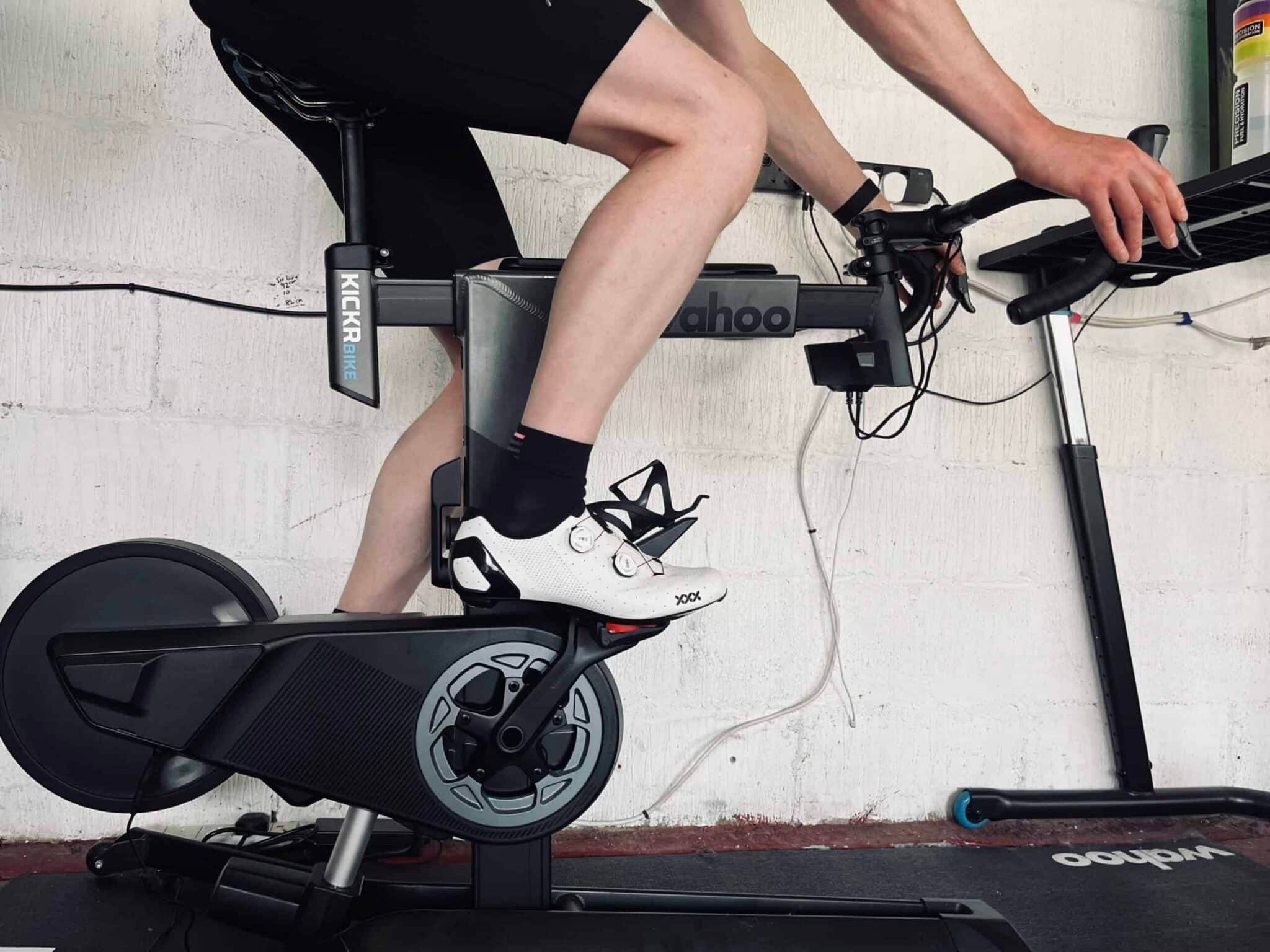 close up legs of cyclist on indoor turbo