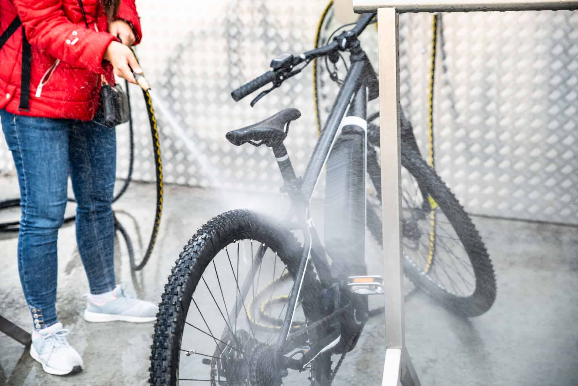 Woman Washing Mountain Bike